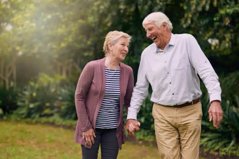 Older couple walking trail outside in West Chester, OH